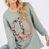 SAGE + FIG Floral Peace Patch Round Neck Top 2 SAGE + FIG Floral Peace Patch Round Neck Top -Little Loom Store 38b2ba91 fc69 403f a152 01235b3f6d6f Min