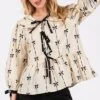 SAGE + FIG Bow Print Tie Front Babydoll Blouse